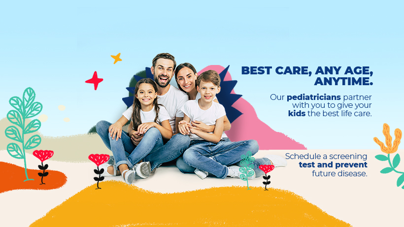 A family of four poses for paediatrics campaign